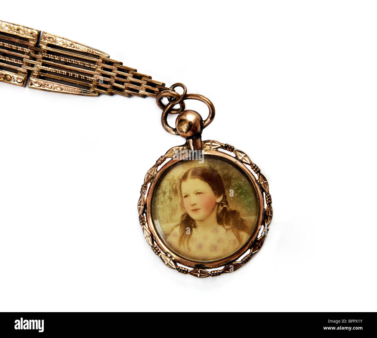 Antique locket with portrait of little girl, isolated on white
