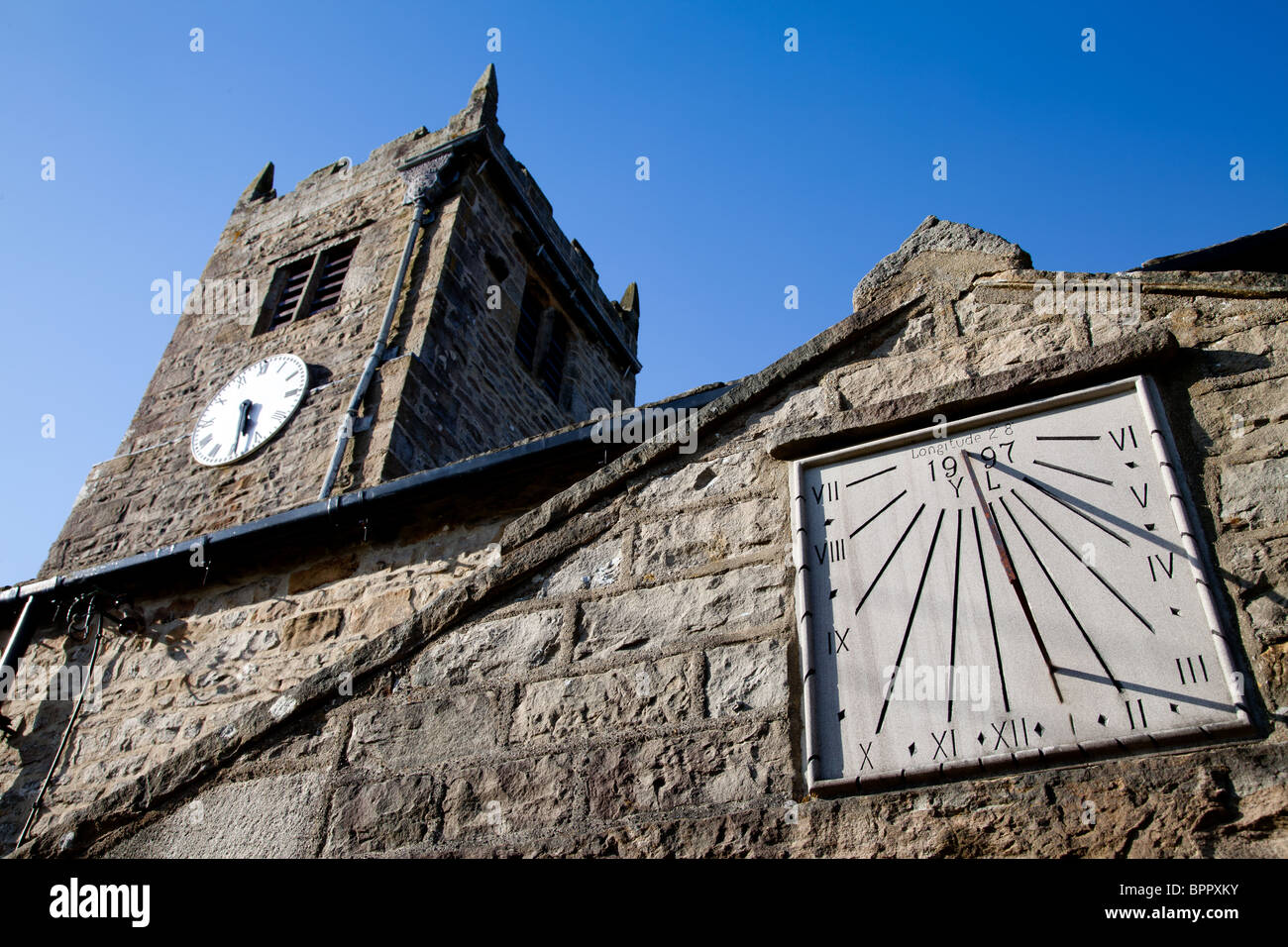 Two clocks in a Mucker, a small village in the Yorkshire Dales Stock ...