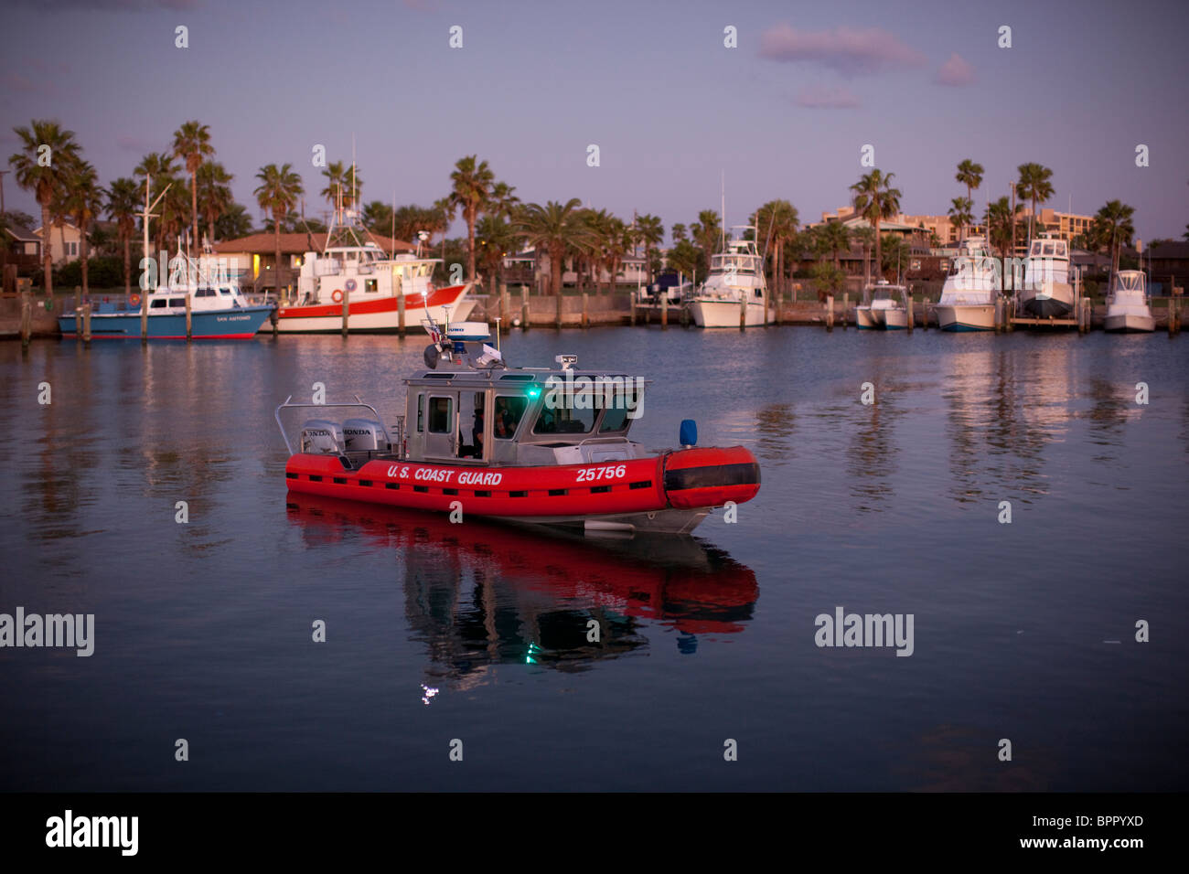 U.S. Coast Guard patrol boat heads out of the harbor in Port Aransas