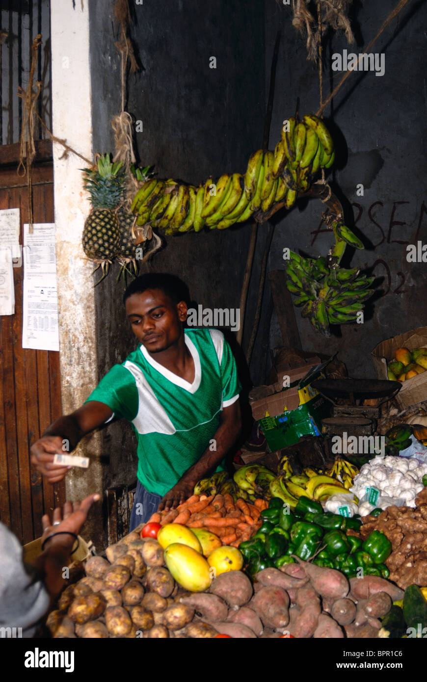 Fruit and vegetable stall holder, Lamu town, Lamu Island, Kenya Stock