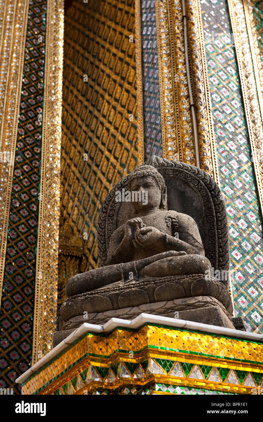 Stone buddhas carved in 9th century Javanese style at the 4 corners of Phra Mondop building, Grand Palace, Bangkok, Thailand Stock Photo