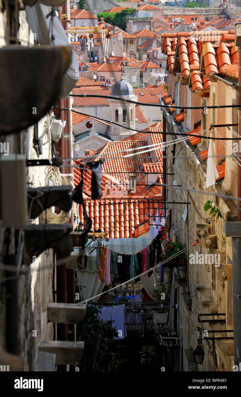 DUBROVNIK, CROATIA. A view down a street in the old walled town, with the Orthodox Church visible in the middle of the picture. Stock Photo