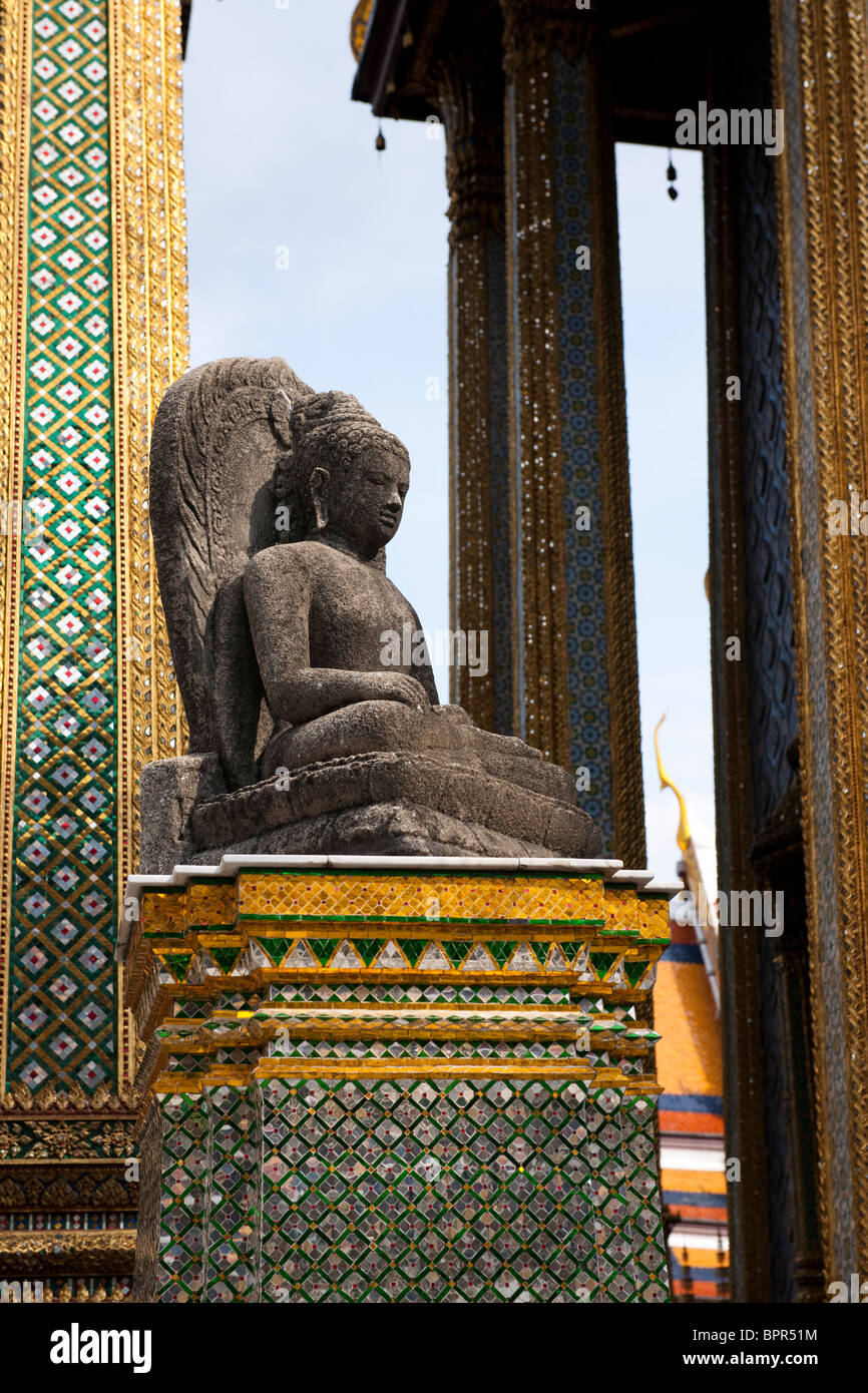 Stone buddhas carved in 9th century Javanese style at the 4 corners of Phra Mondop building, Grand Palace, Bangkok, Thailand Stock Photo