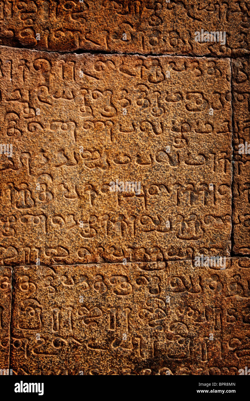 Ancient inscriptions on stone wall in Tamil language Stock Photo ...