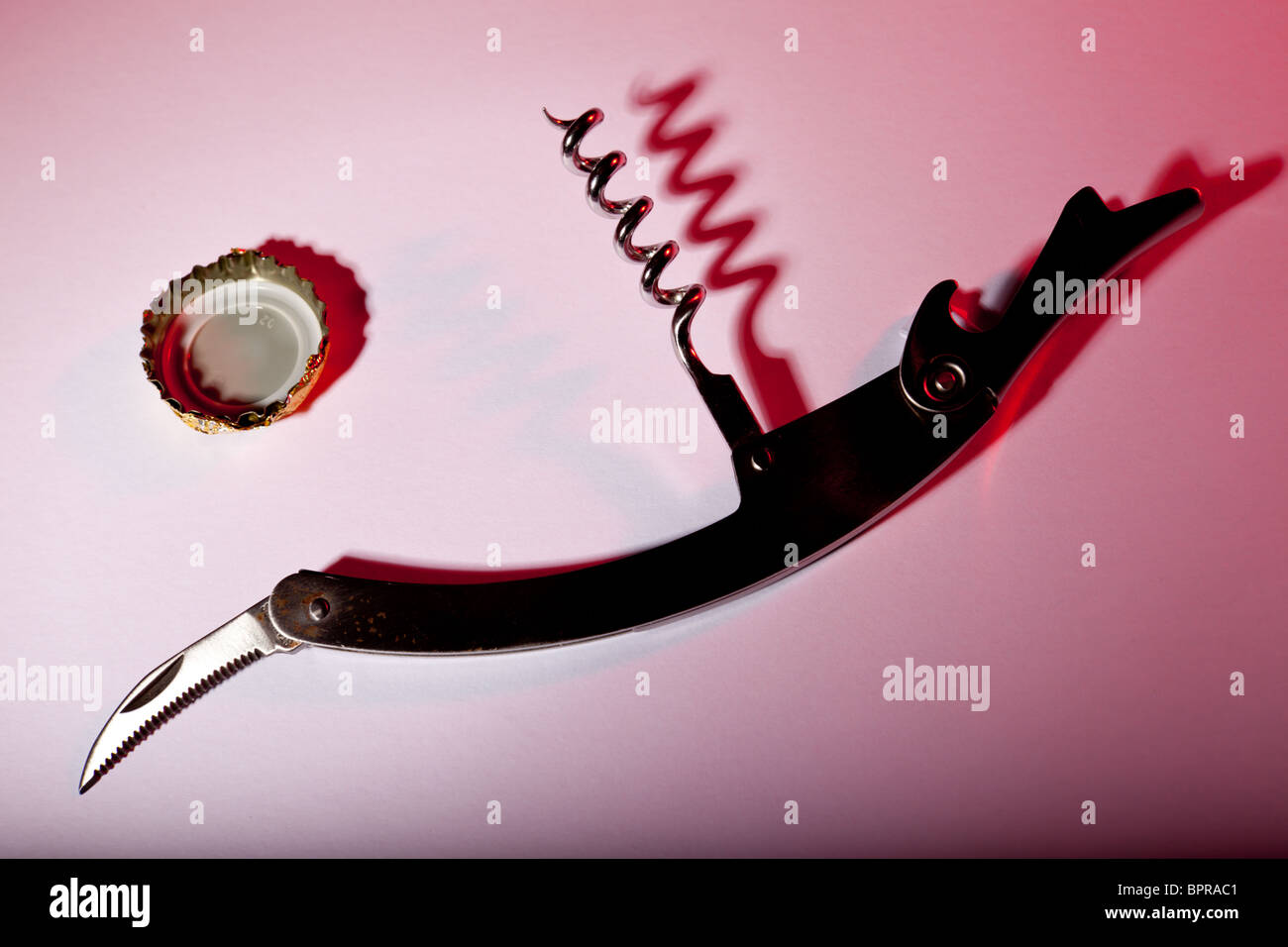 A studio image of a traditional French corkscrew - otherwise known as the waiters friend Stock Photo