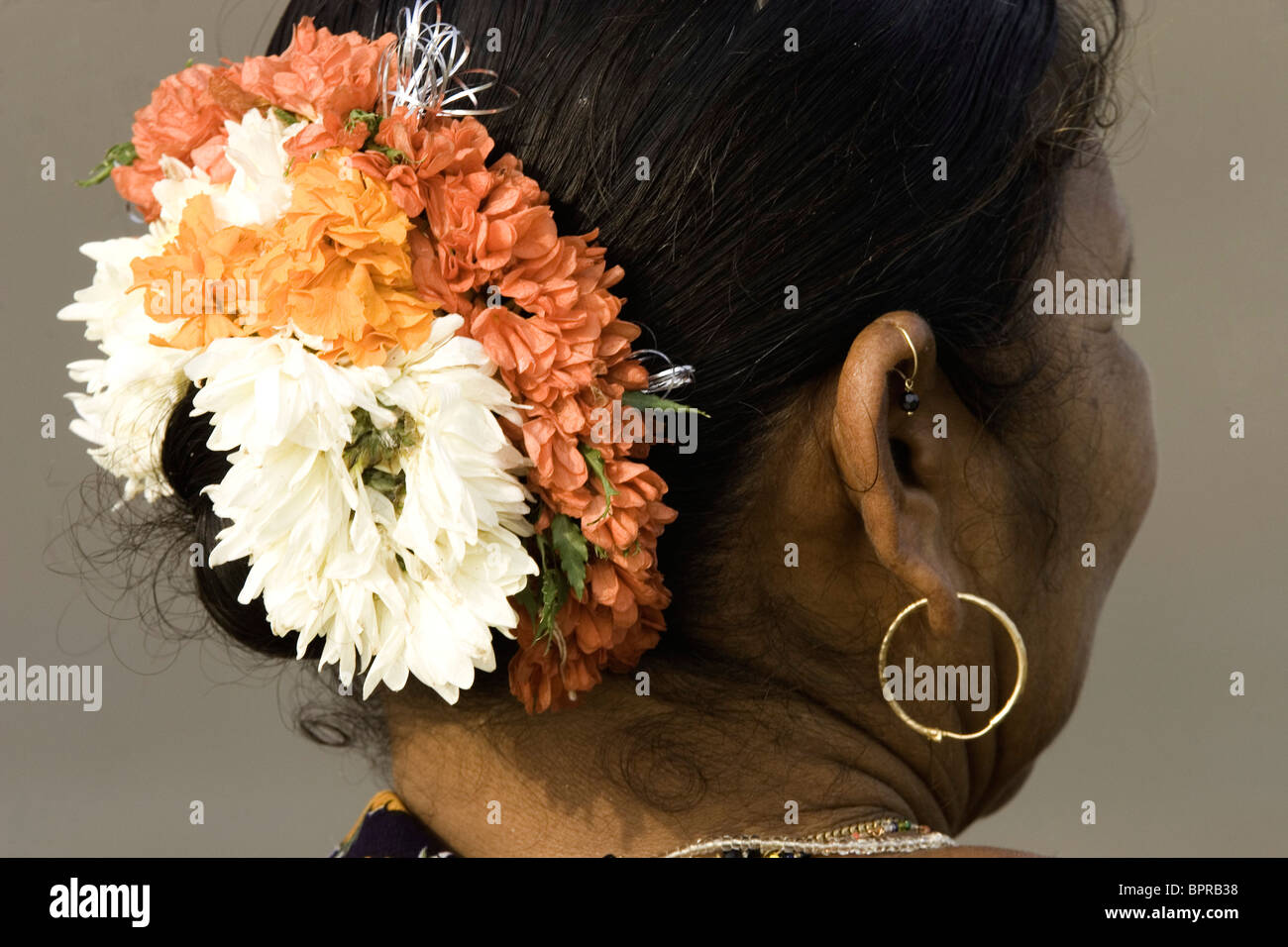 Goan women wears Gajra (flower garland) to dress her hair. Stock Photo