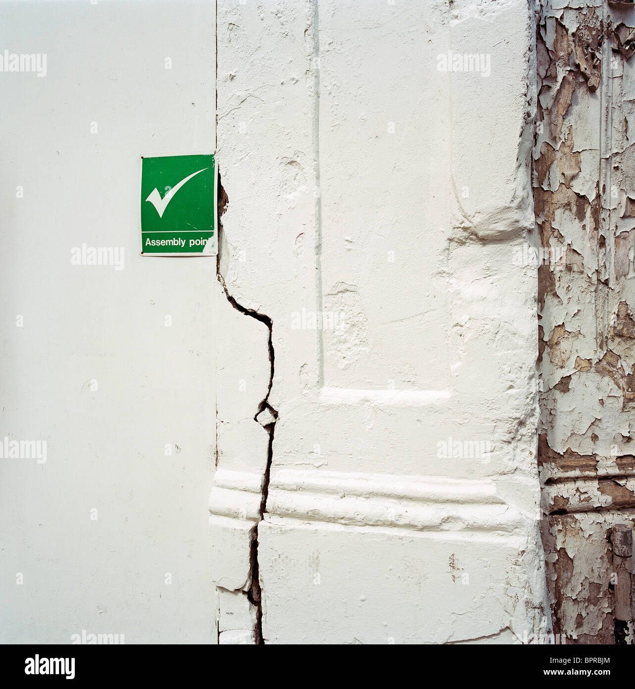 White assembly point sign on hi-res stock photography and images - Alamy