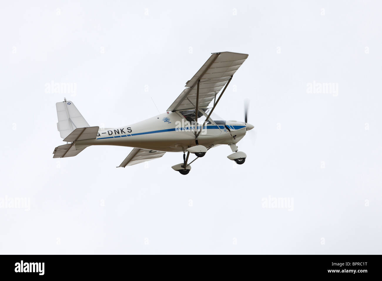 Ikarus C42 FB80 G-DNKS in flight after take-off from Breighton Airfield Stock Photo