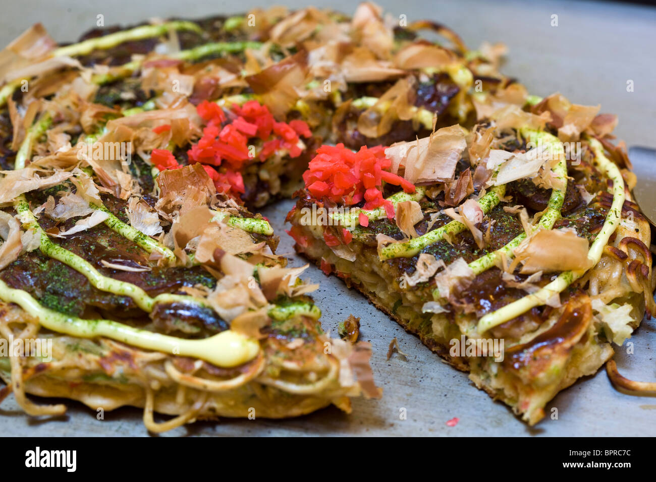 Pork Okonomiyaki Japanese dish Stock Photo Alamy