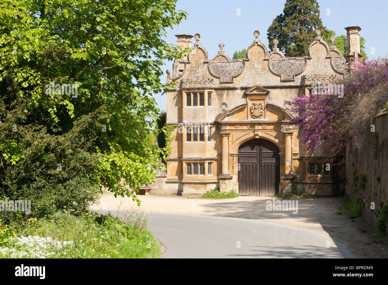 The Jacobean Cotswold stone gatehouse to Stanway House, Stanway, Gloucestershire UK Stock Photo