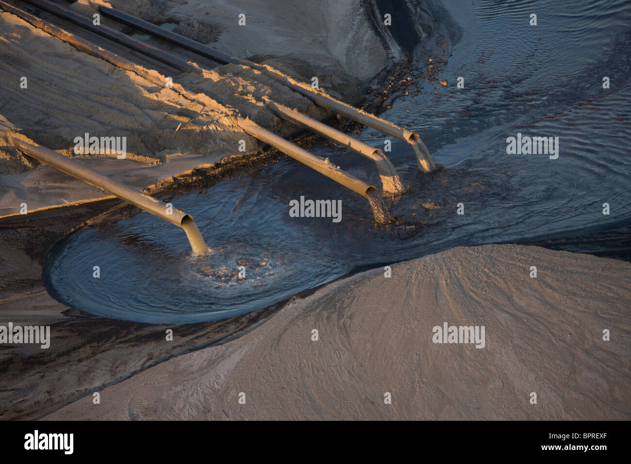 Tailings pond outflow pipes, Suncor Millenium Mine,Fort McMurray, Canada Stock Photo Alamy