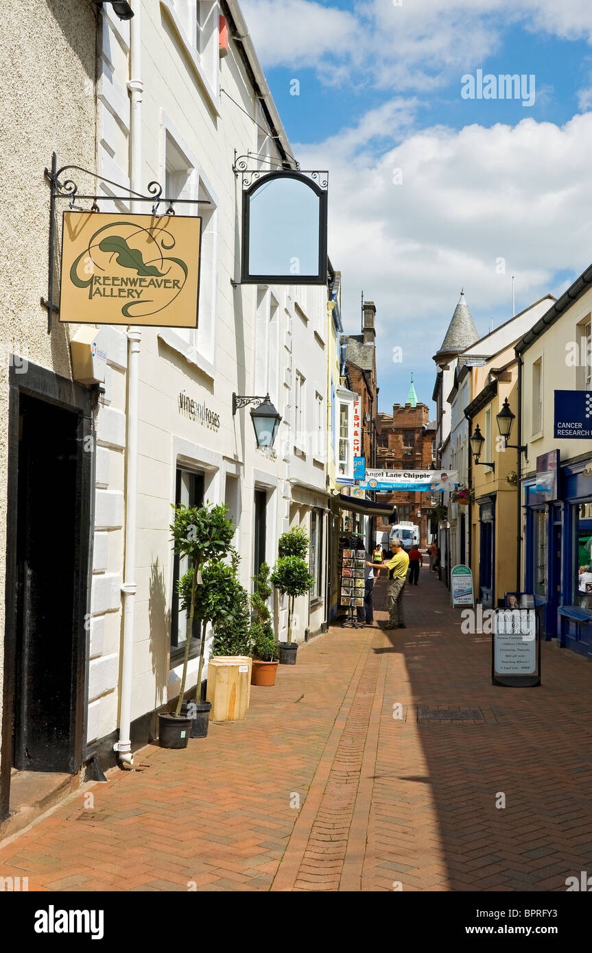 Shops stores in Angel Lane in summer Penrith town centre Cumbria