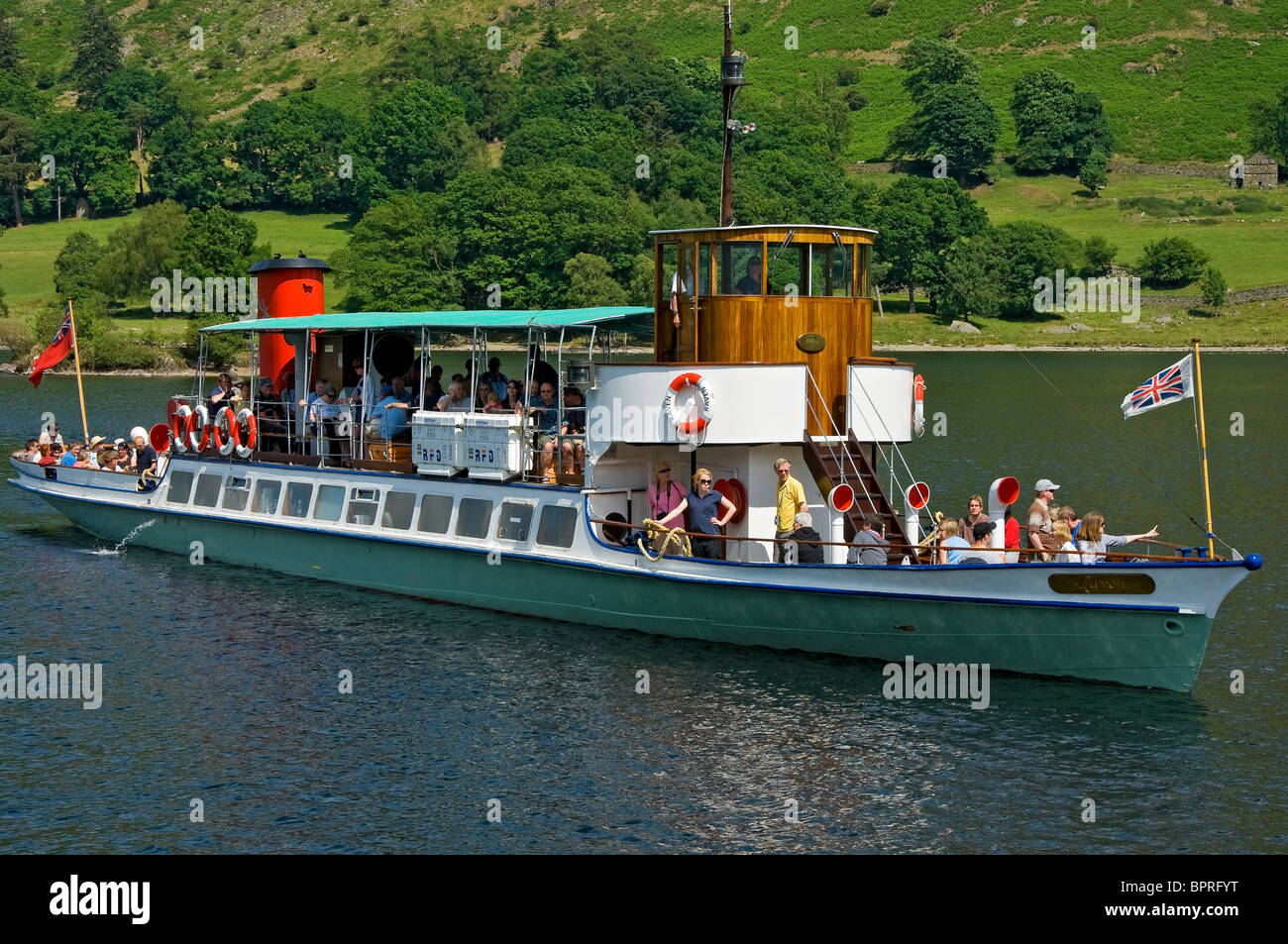 People tourists visitors on board The Steamer Raven on Ullswater in summer Lake District National Park Cumbria England UK United Kingdom Great Britain Stock Photo