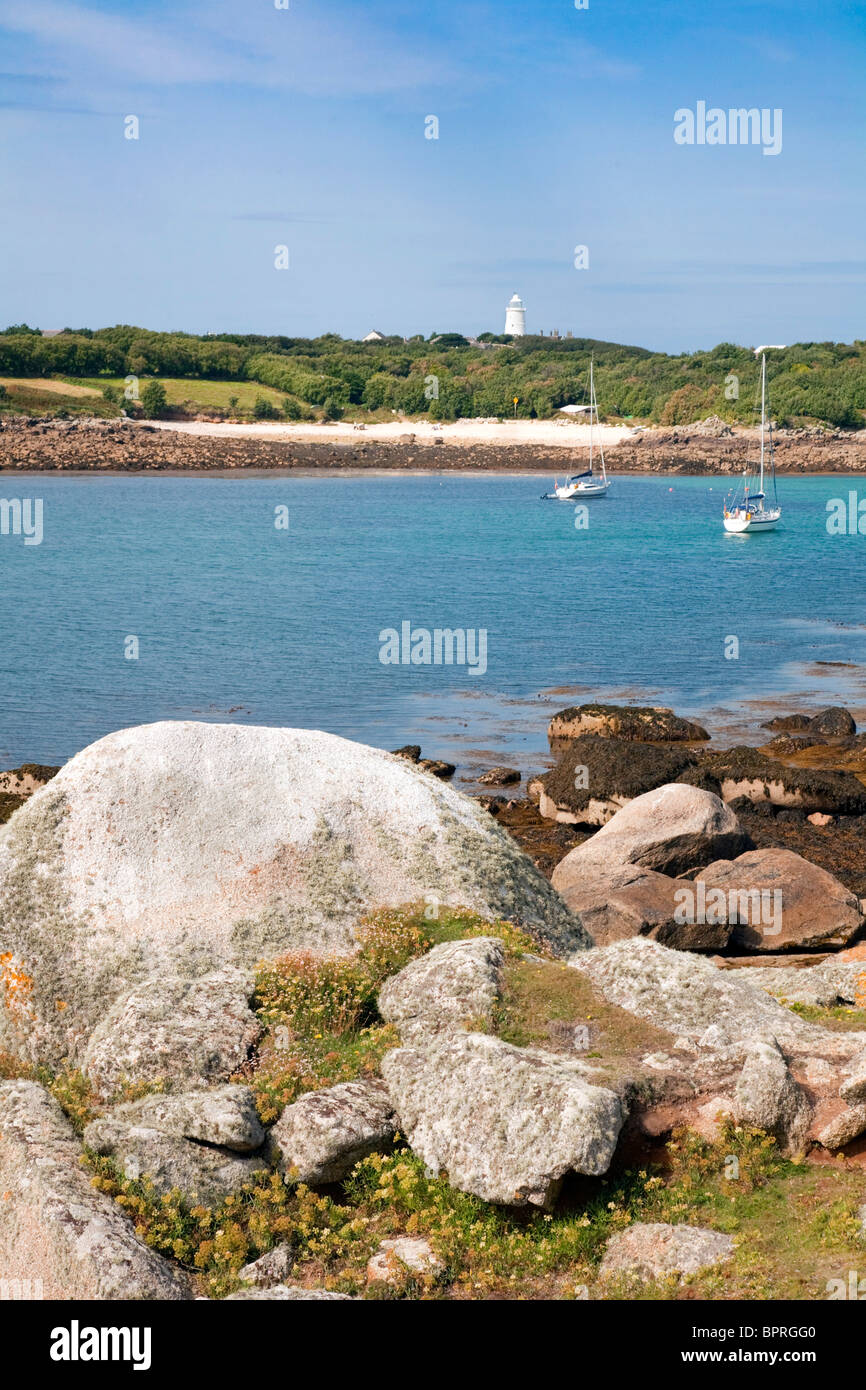 St Agnes; Isles of Scilly; Beady pool with the lighthouse beyond Stock