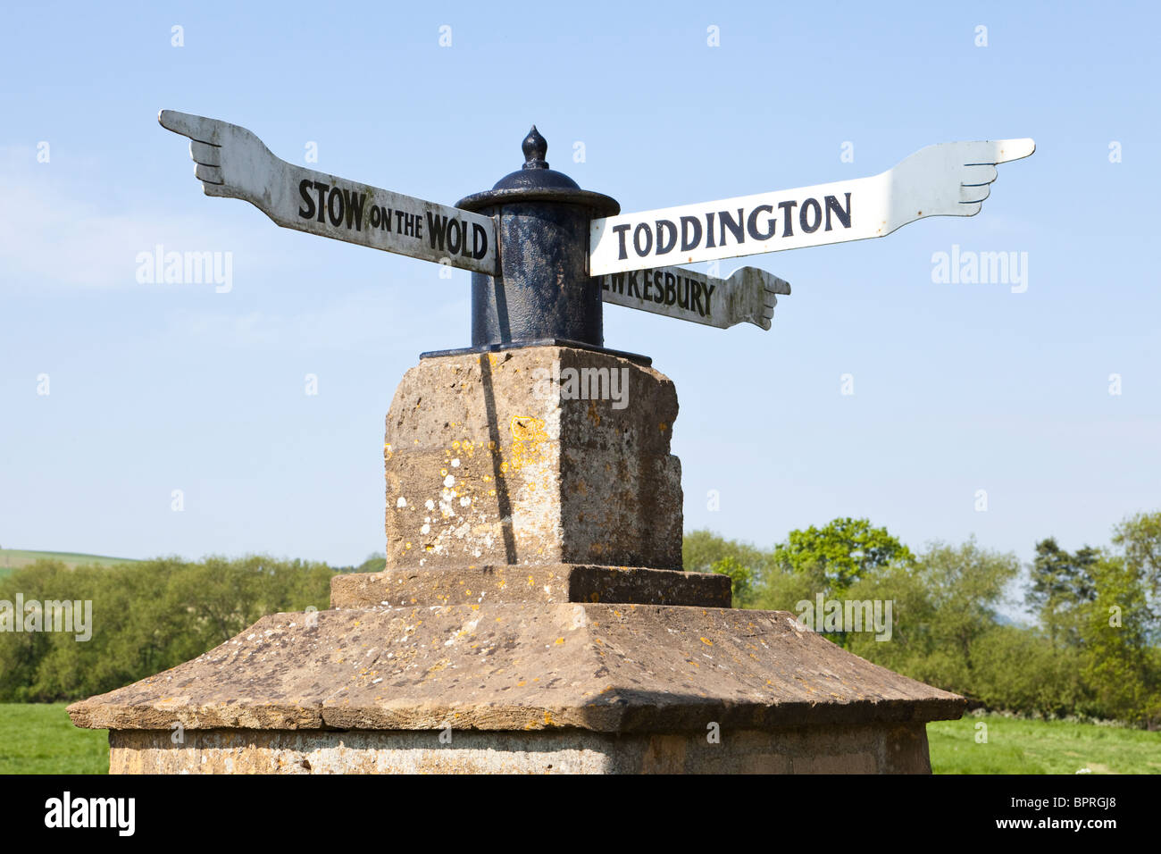 Eighteenth century fingerpost beside the B4077 Stow to Tewkesbury road at Toddington, Gloucestershire UK Stock Photo