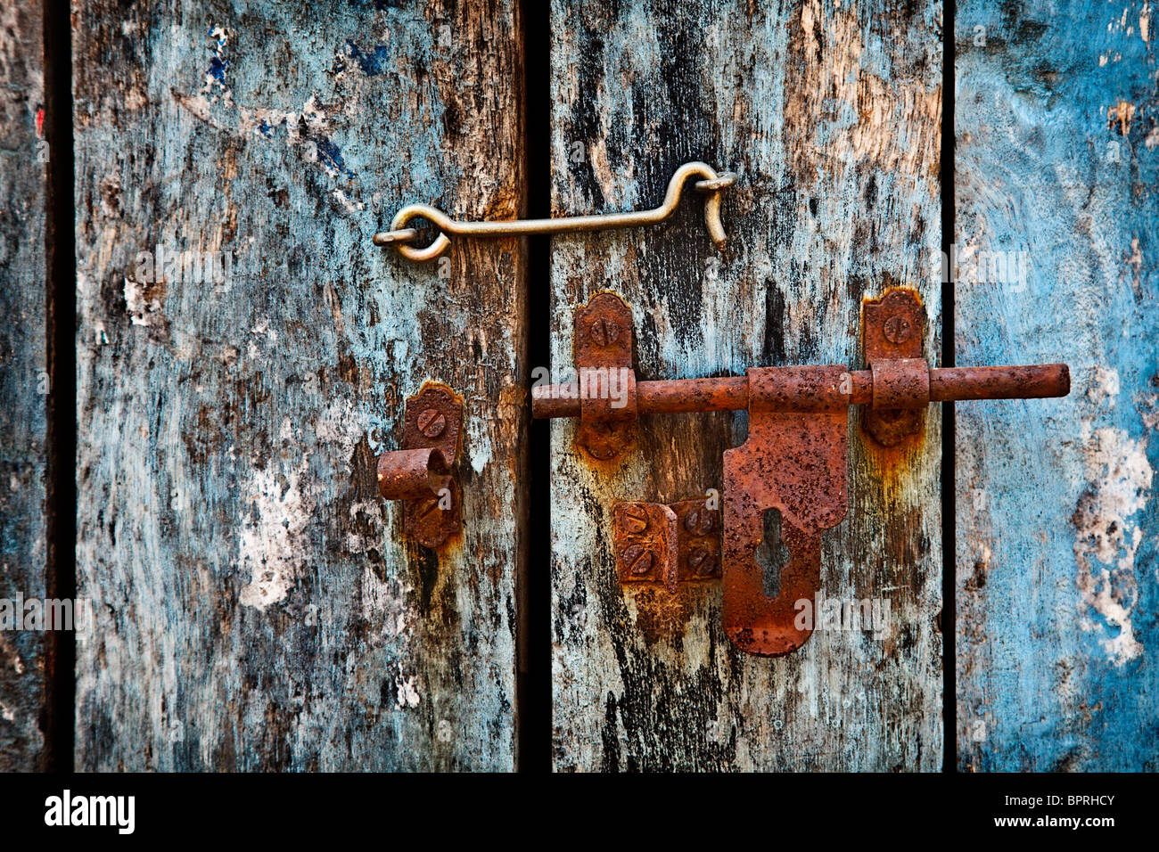 Old latch with padlock on the door Stock Photo Alamy