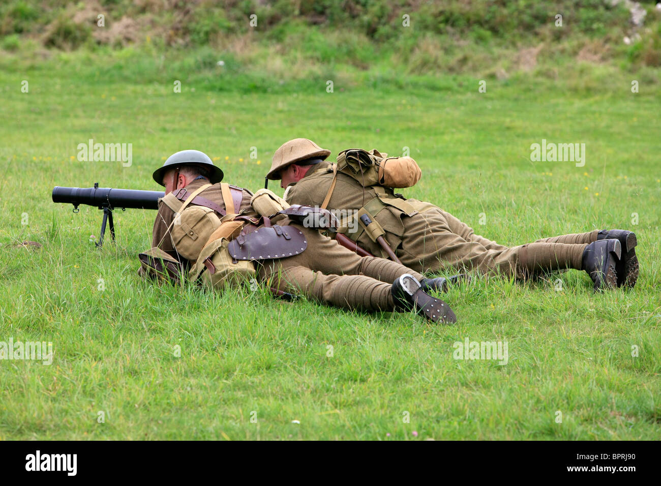 Two WW1 re-enactment group demonstrate the firepower of the Lewis machine gun Stock Photo