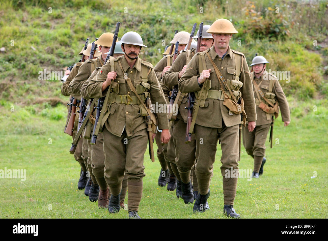 Group of WW1 British reenactment group demonstrate Army drill Stock Photo