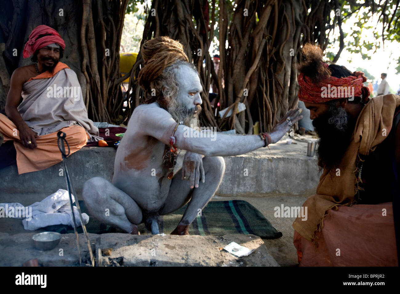 A Sadhu Holy Man Is Blessing A Follower At The Kumbh Mela