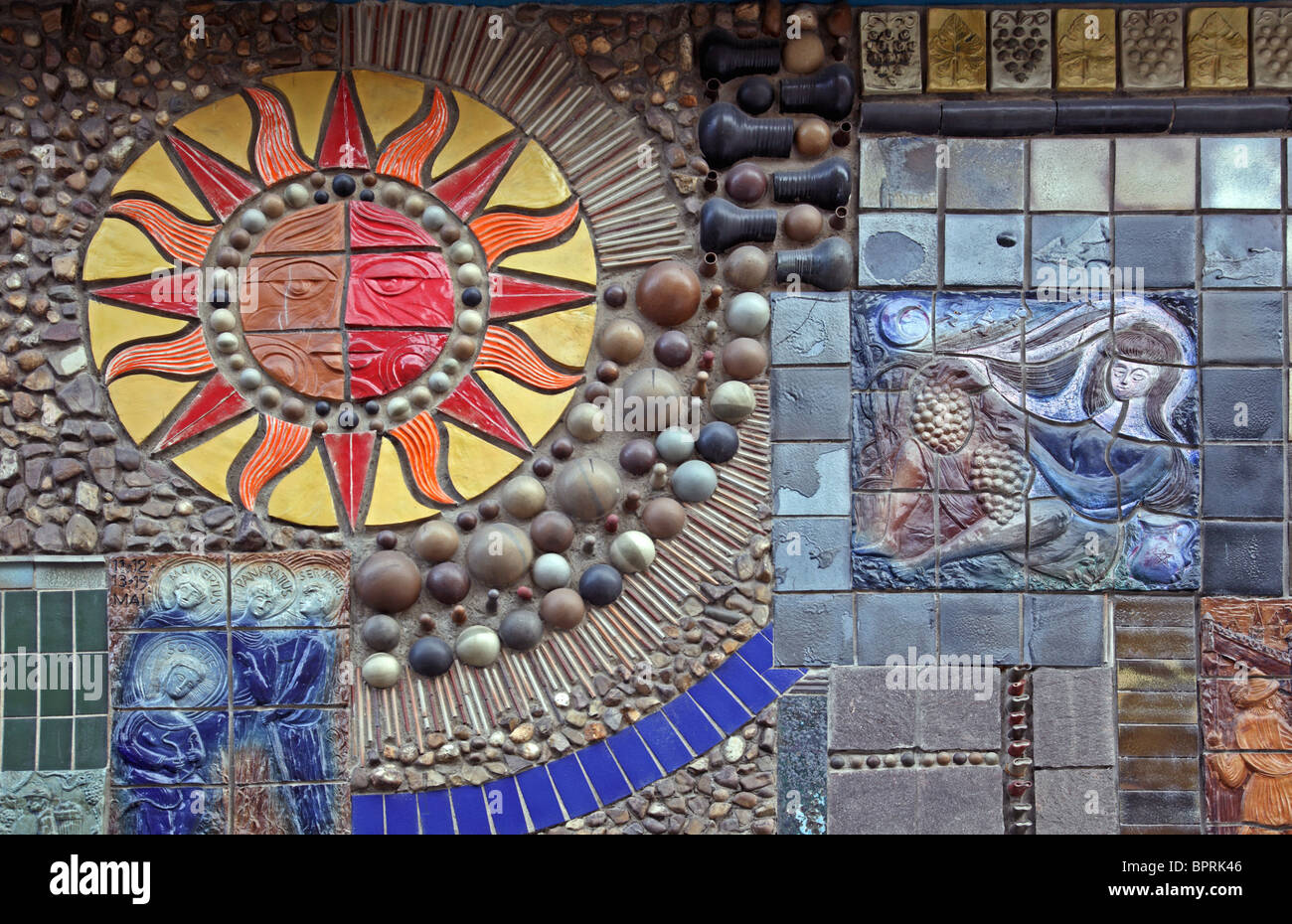 tiled sun emblem on a wall showing frost saints as a weather symbol Rhineland Palatinate Germany Europe Stock Photo