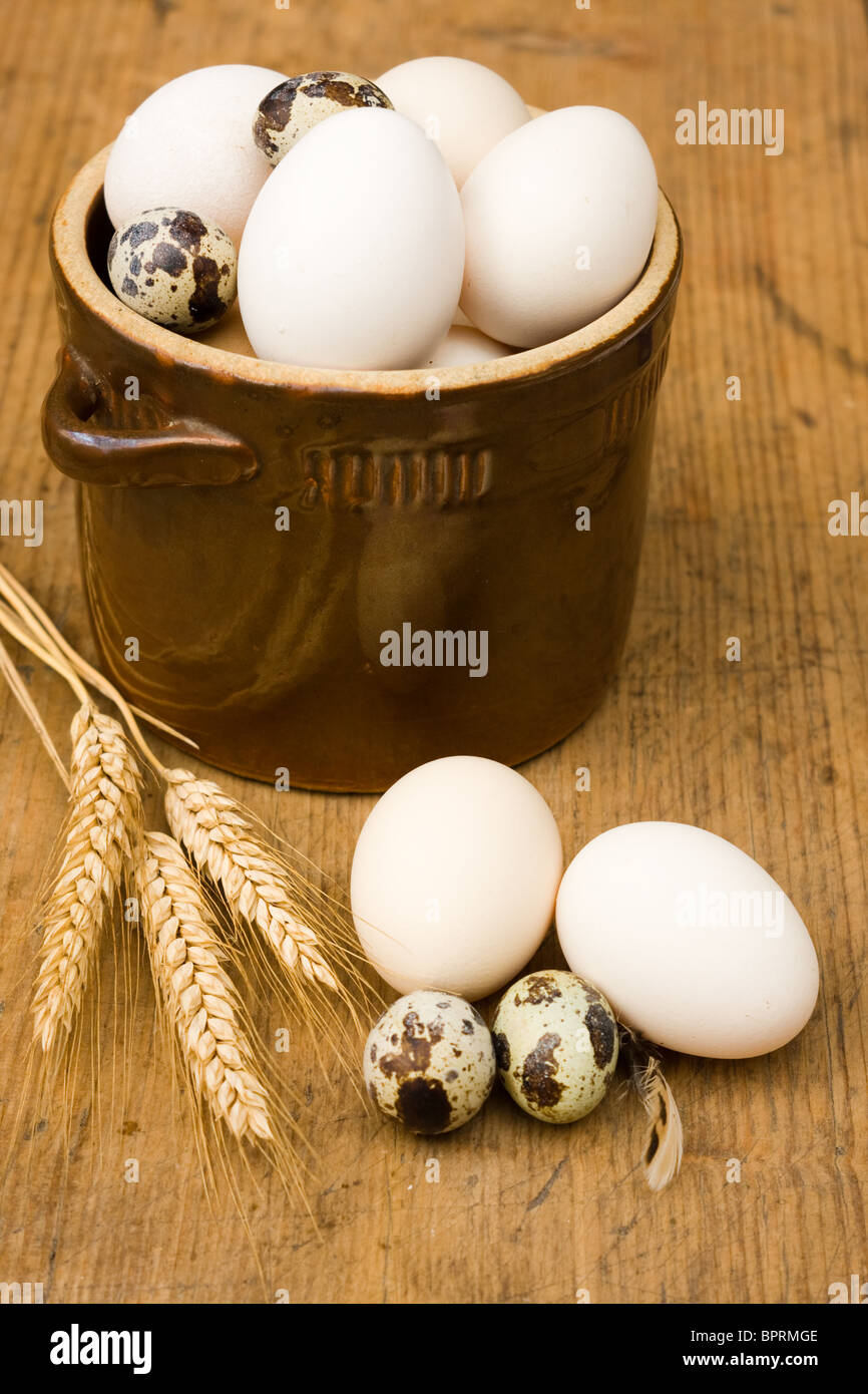 Eggs in old bowl Stock Photo
