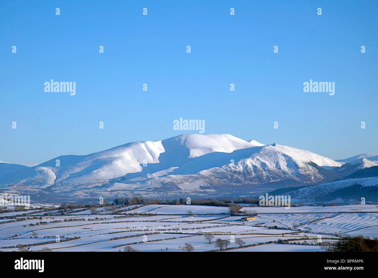 A snowcovered Skiddaw in the Lake District seen from Tallentire Hill