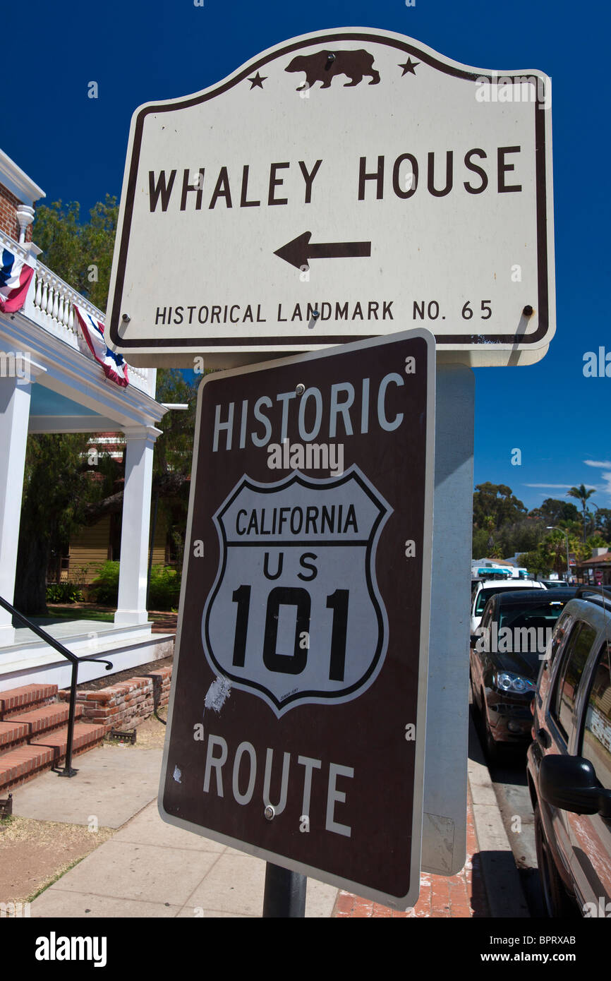 California historical landmark sign in front of Whaley House along with Historic Route US 101 sign, Old Town San Diego Stock Photo