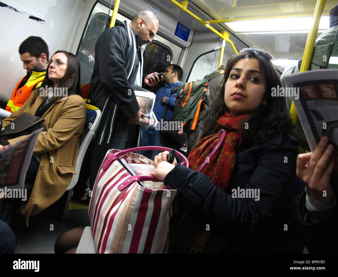 Commuters on a peak hour train in Melbourne, Australia Stock Photo