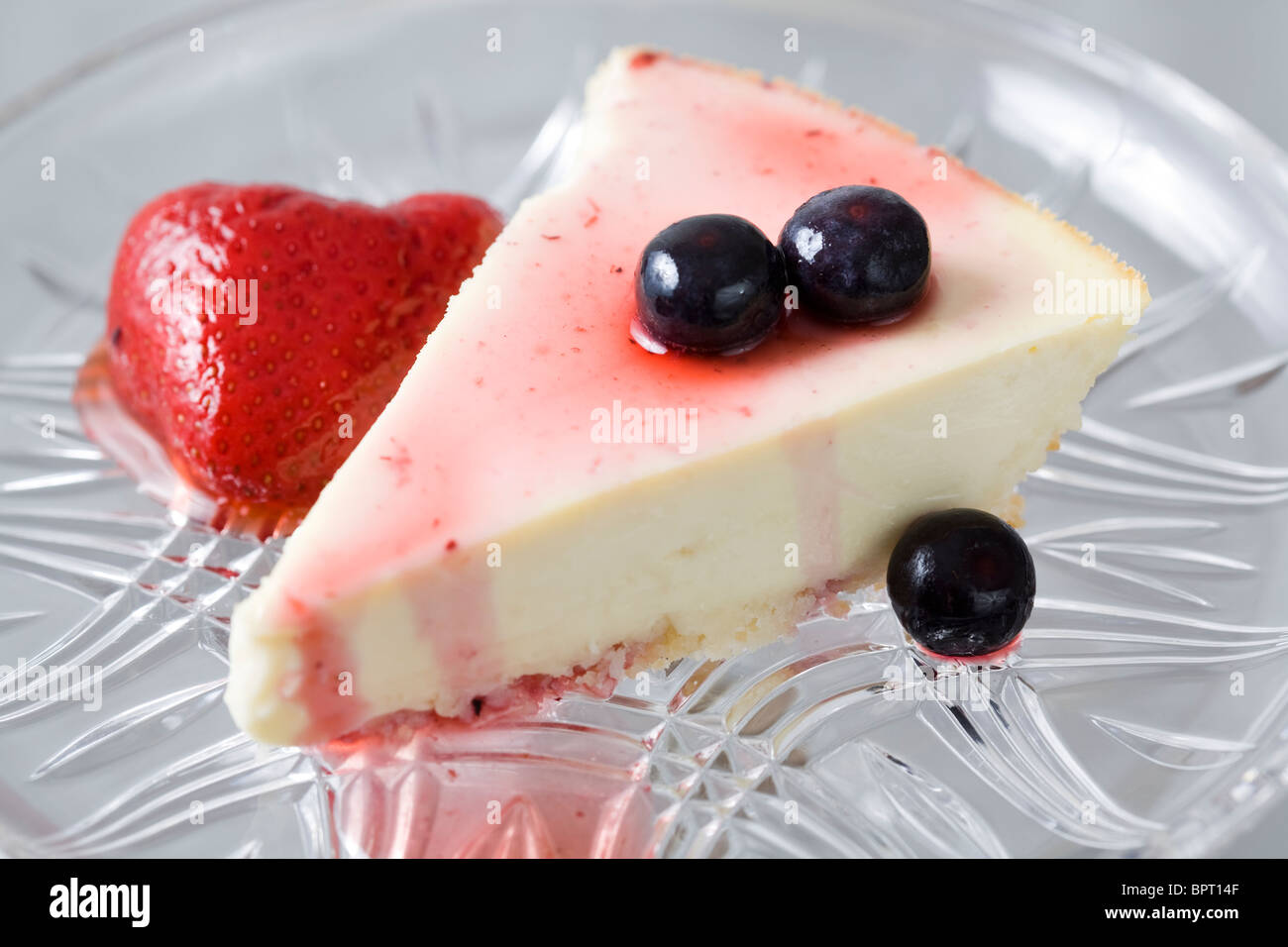 Cheesecake with strawberry and blueberries. Stock Photo