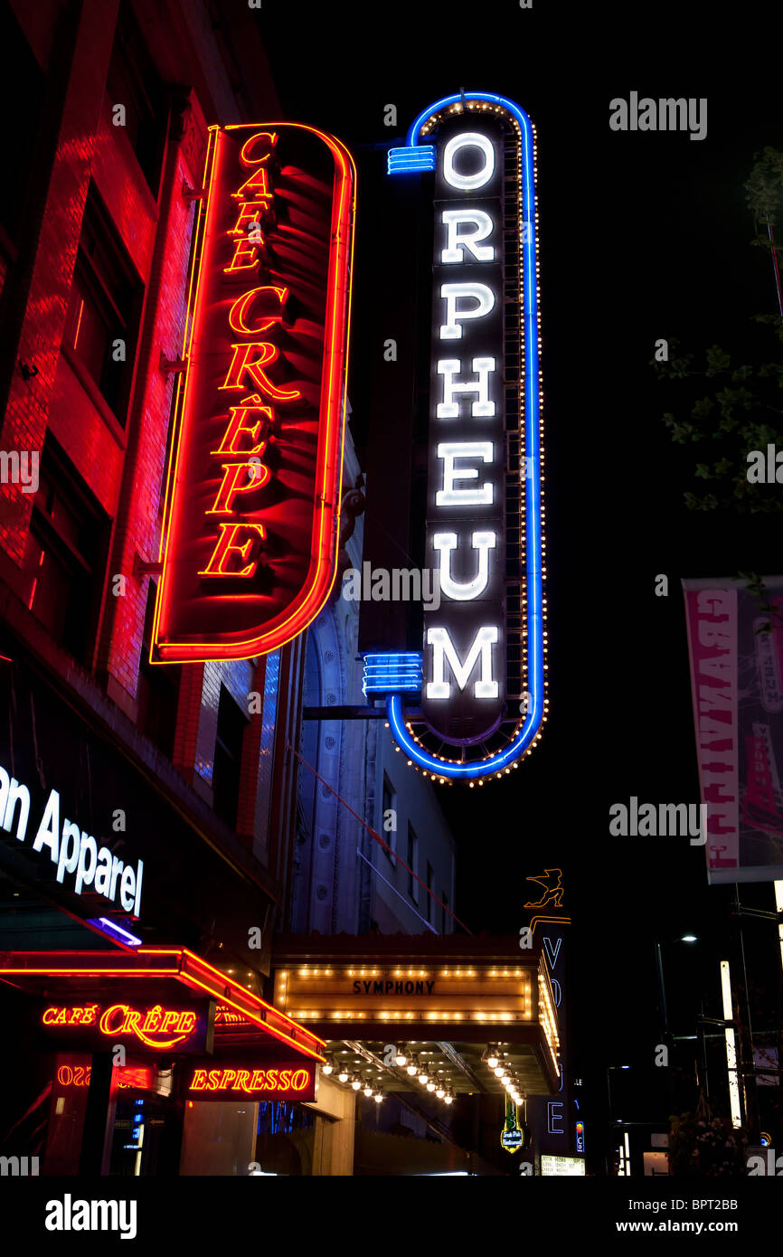 Orpheum and Cafe Crepe signs illumated at night, Granville Street, Vancouver, British Columbia, Canada Stock Photo