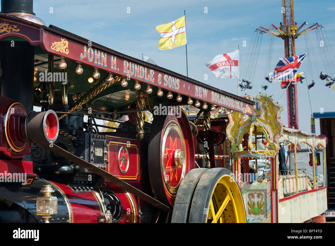 1912 Brown & May Showmans Traction engine 'General Buller' in front of a fairground at the Great Dorset steam fair, England Stock Photo