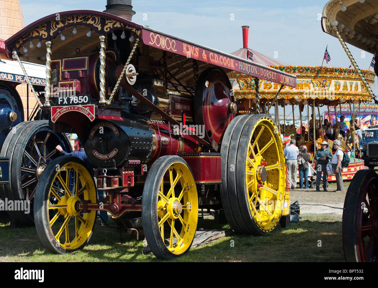 Showmans Traction Engine in front of a steam fairground ride at the Great Dorset steam fair 2010, England Stock Photo