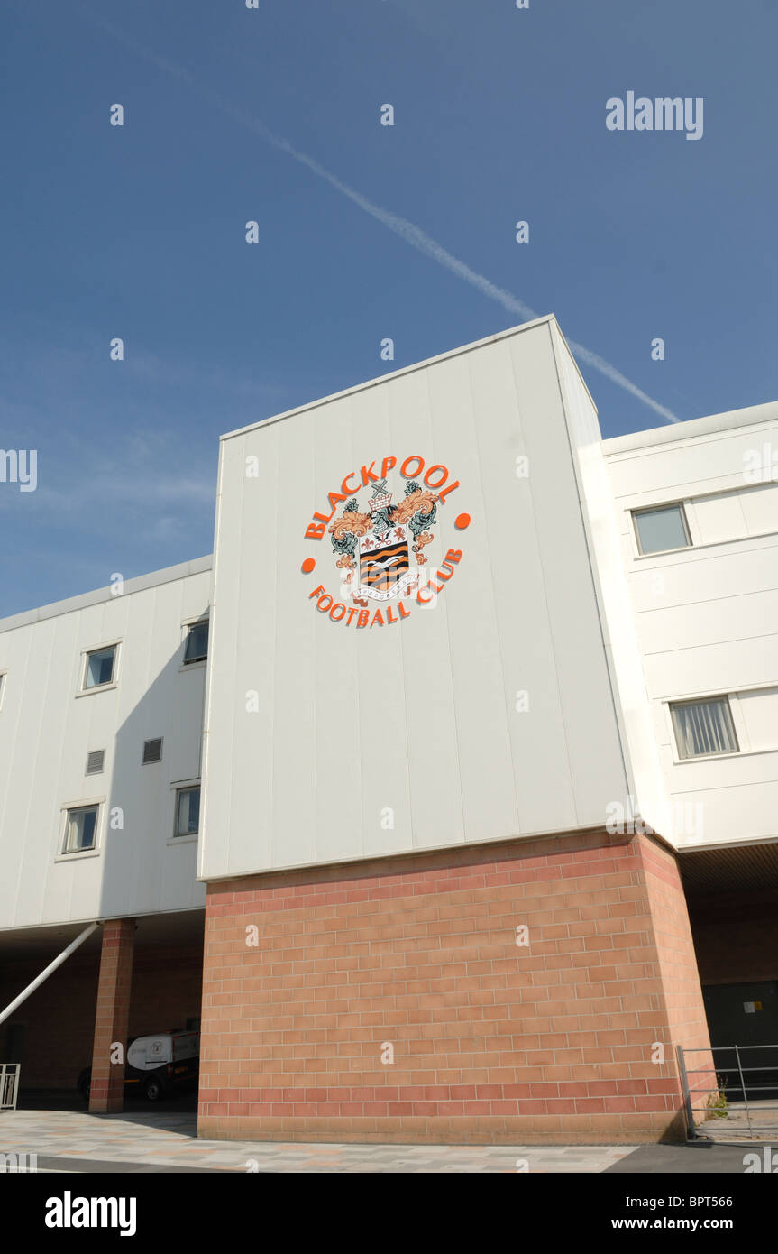 Blackpool Football Clubs Bloomfield Road stadium set against a blue sky. Stock Photo