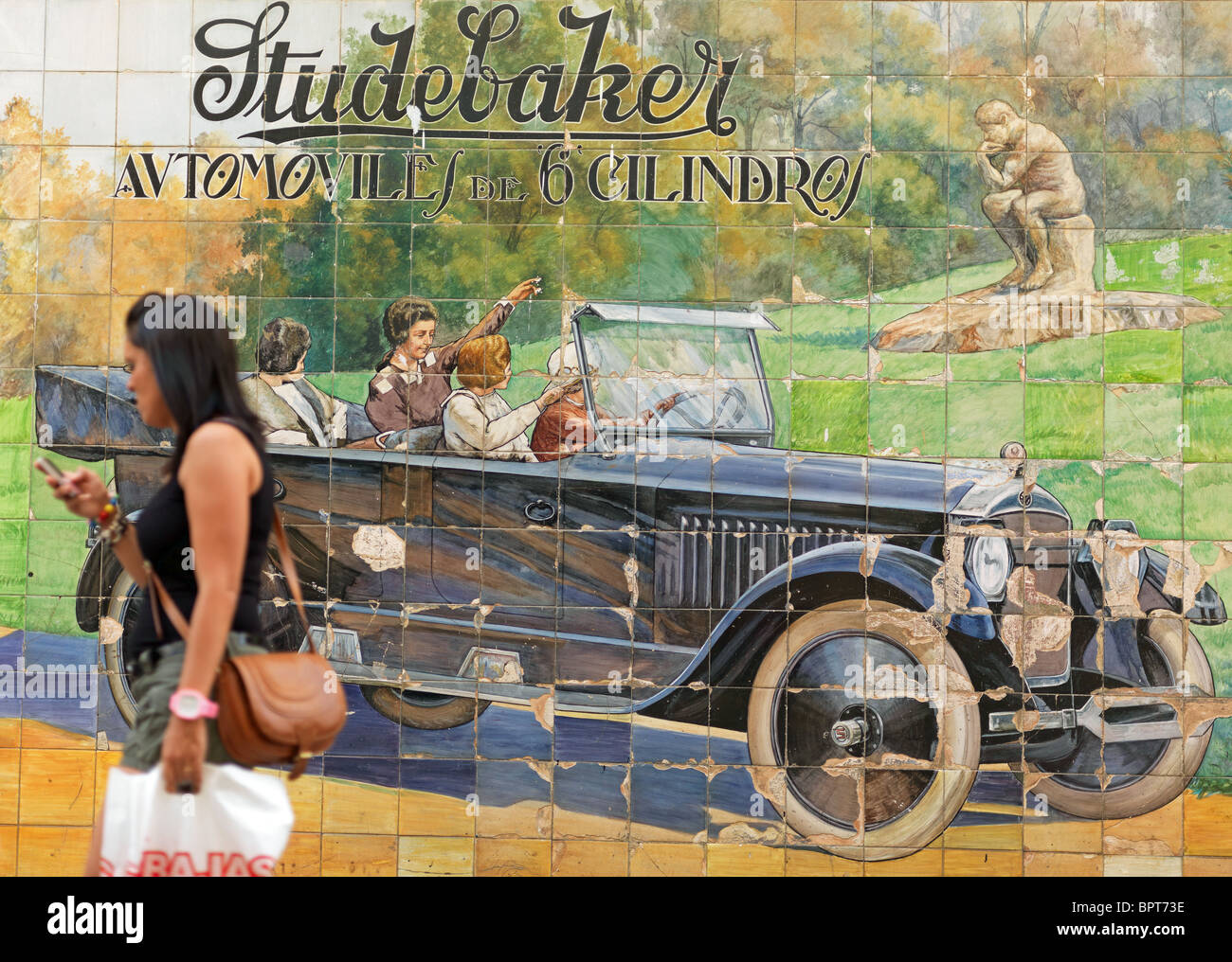 A wall painting showing a historical Studebaker car is pictured in downtown Seville, Andalusia, Spain, August 27, 2010. Stock Photo