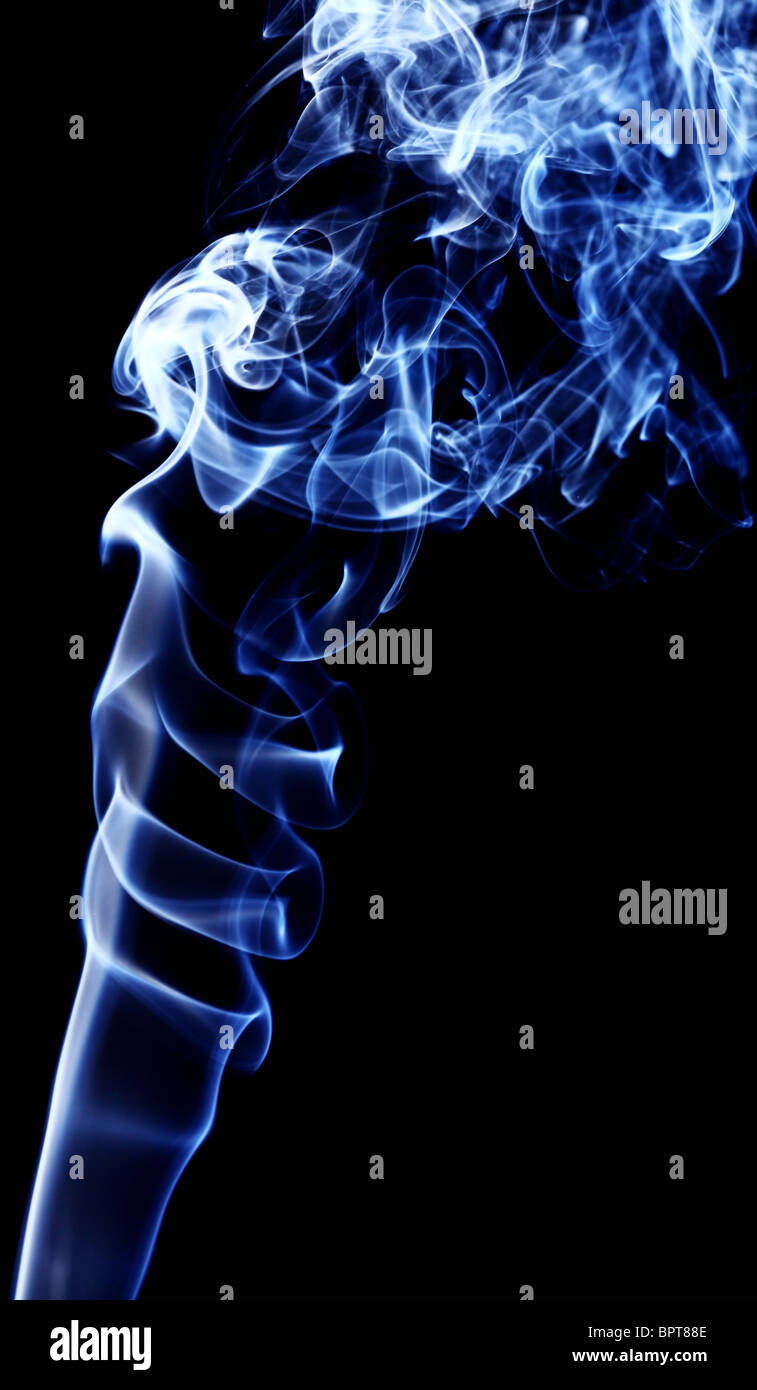 abstract blue smoke against black background Stock Photo - Alamy