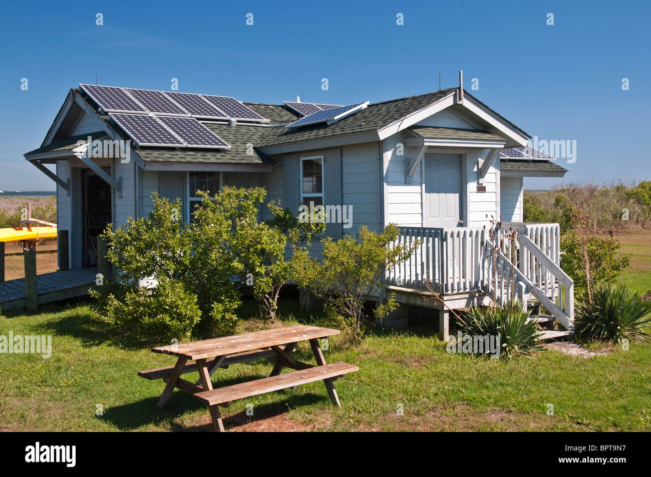 Beach house with photovoltaic solar panels Stock Photo