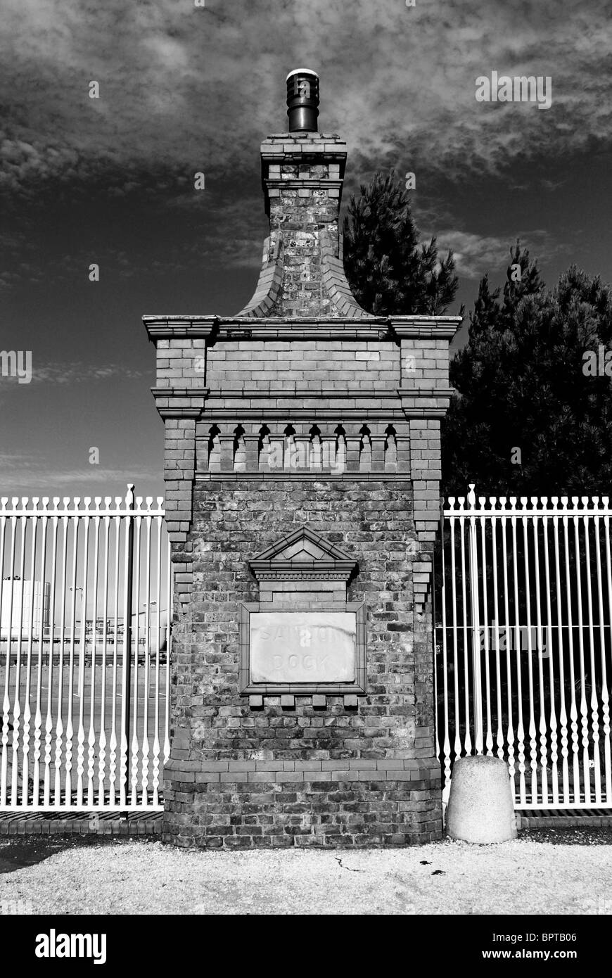 Sandon Dock name inscribed in a sandstone block in the gate pillar in the entrance. Stock Photo