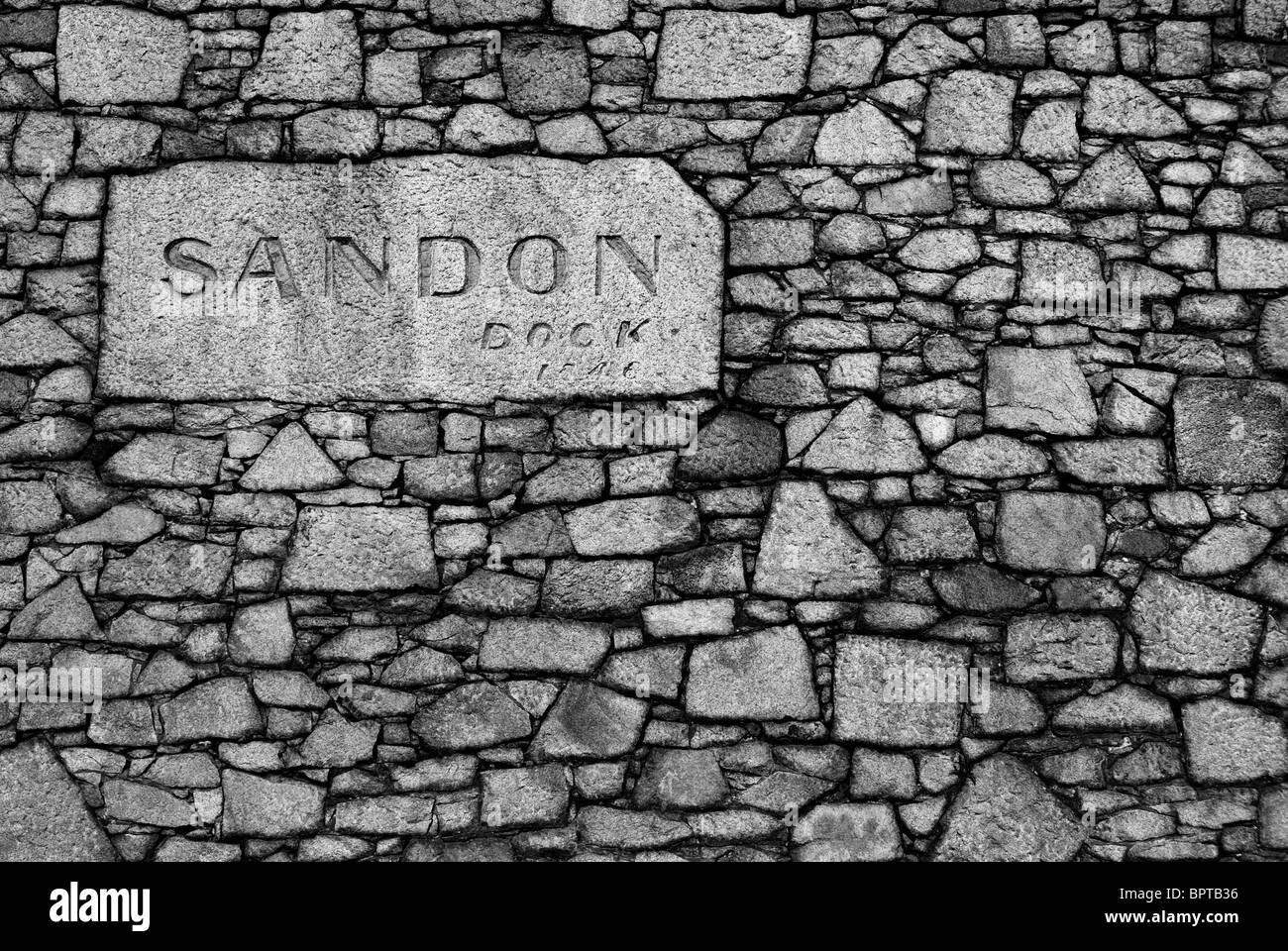 Sandon Dock name written in the dock wall. Stock Photo