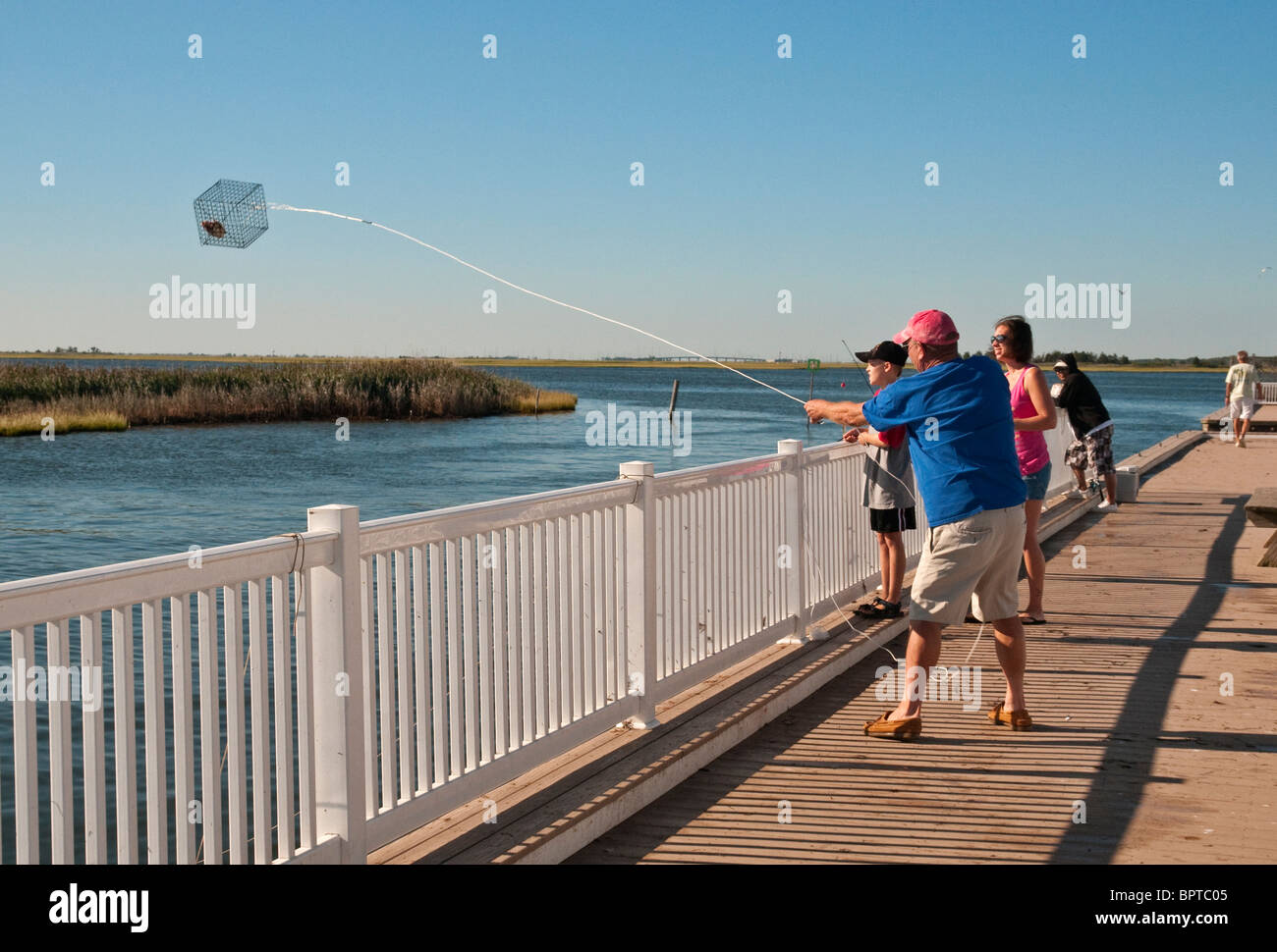 Fishing for blue crabs at Barnegat Bay at the New Jersey Shore Stock