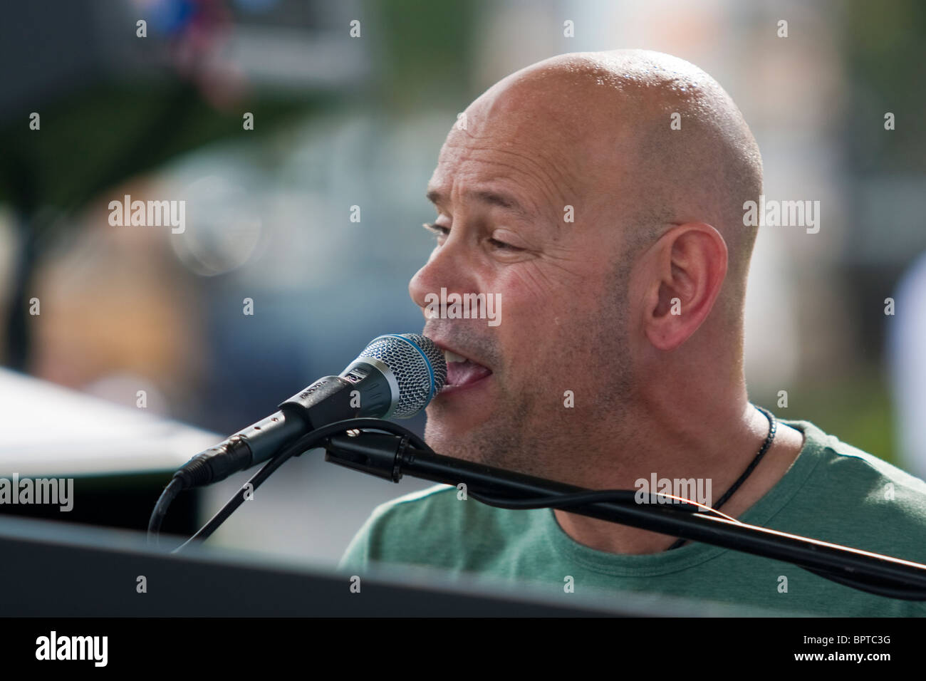 Israeli superstar singer/composer Rami Kleinstein performs at Washington DC-area celebrations of Israel's 62nd Independence Day. Stock Photo