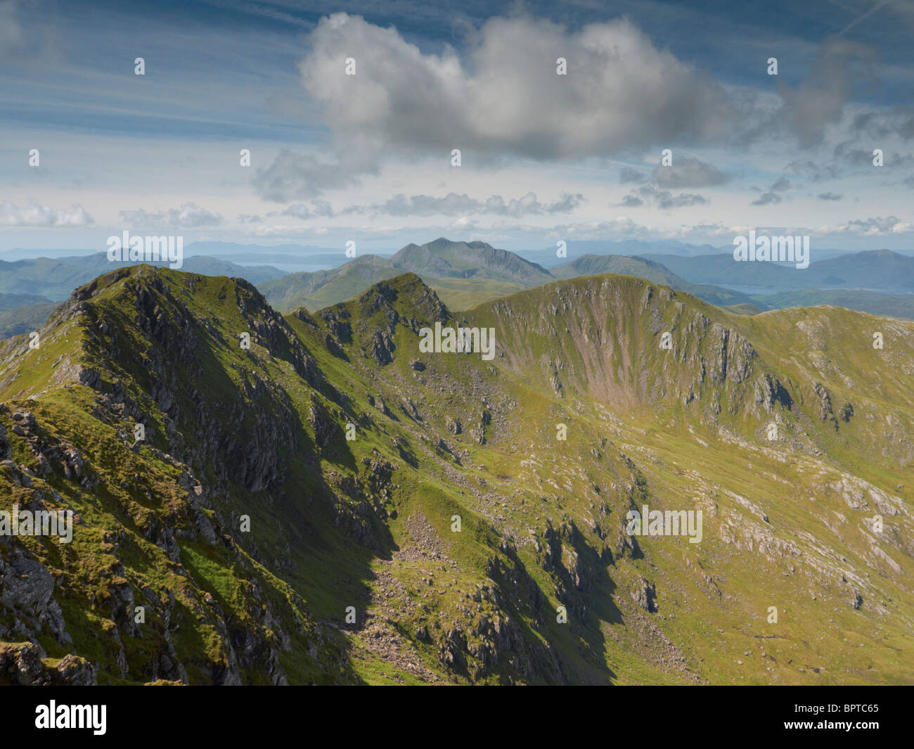 Looking towards the mountains Beinn Sgritheall and the Skye Cuillin from 'The Saddle' Highlands Scotland UK Stock Photo