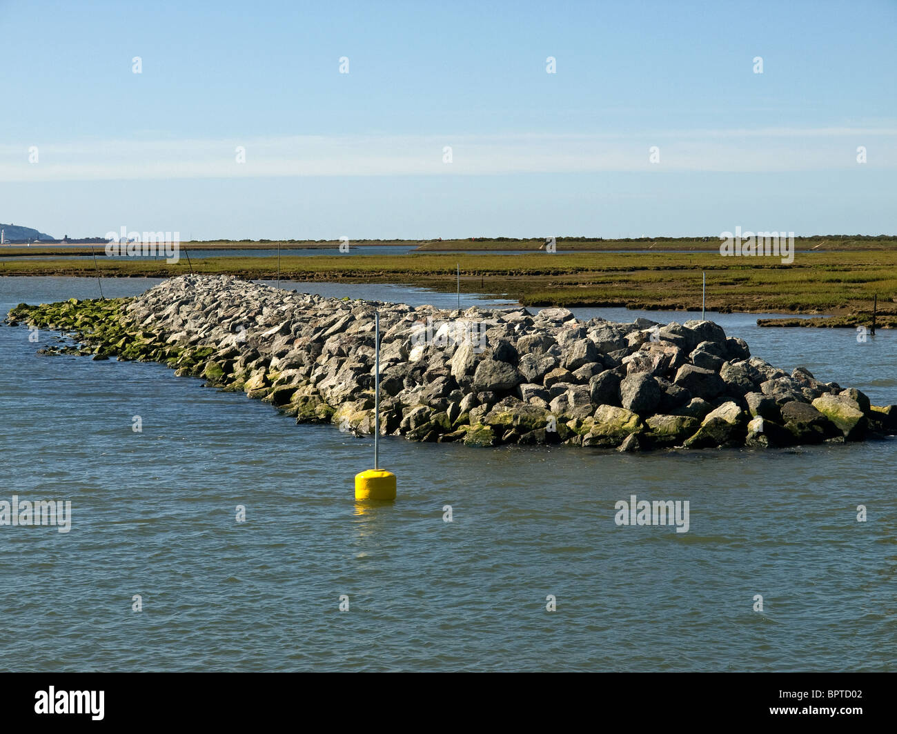 Rock protection breakwater at the entrance to Lymington Harbour