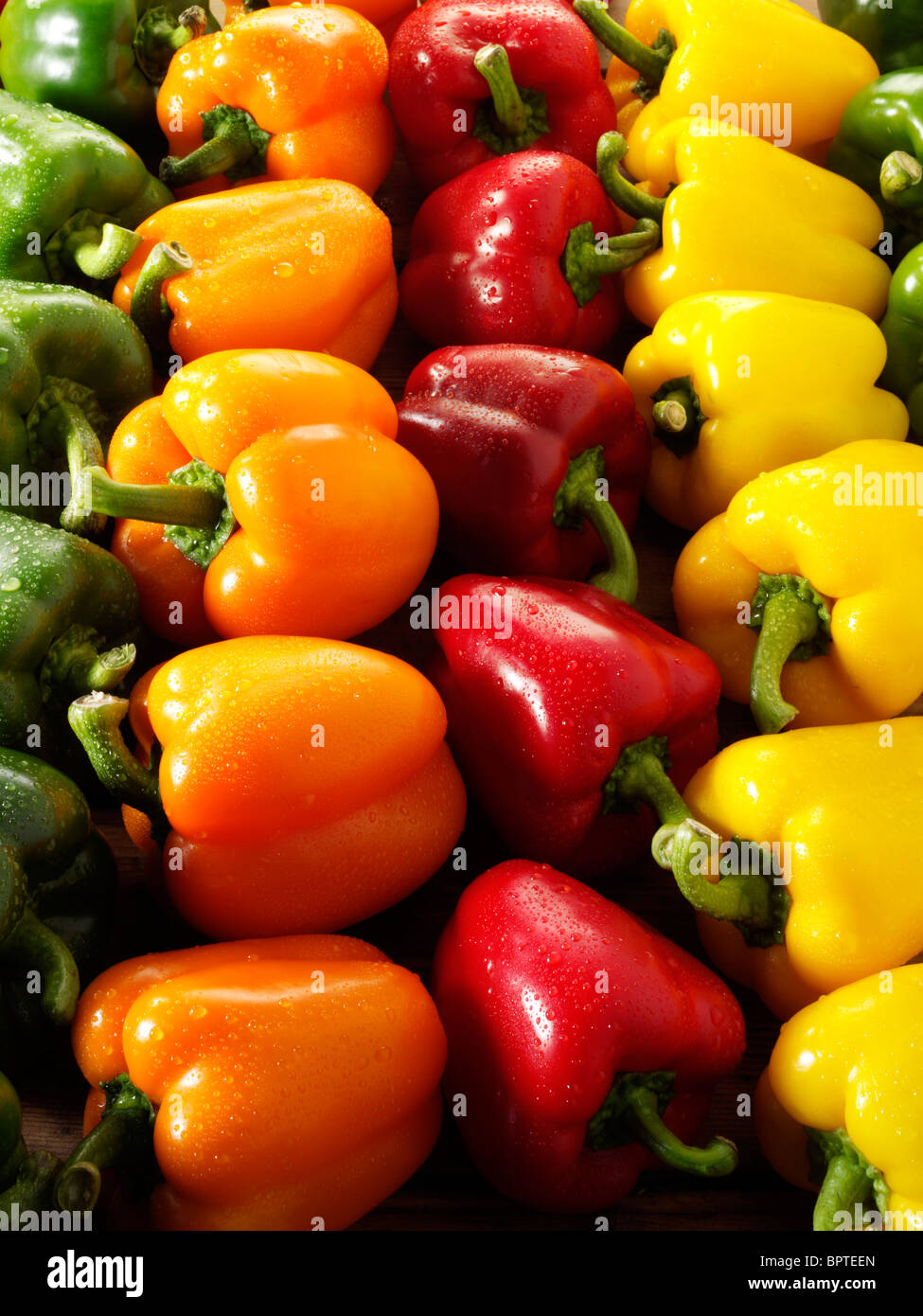 Red peppers with one green pepper hi-res stock photography and images ...