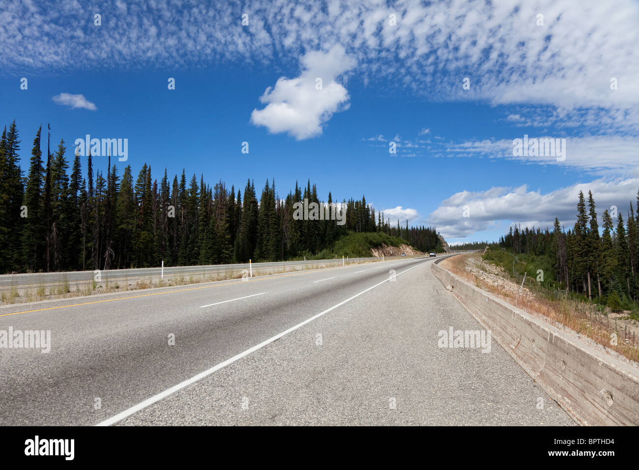 Mountain Highway and blue sky Stock Photo - Alamy