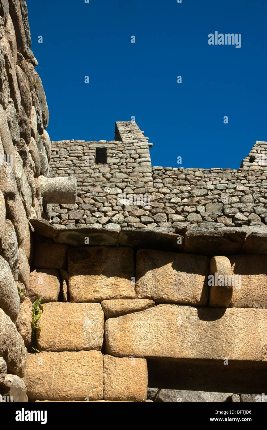 Intricate stonework of a reconstructed Sun Temple at the ancient Incan city of Machu Picchu, Peru. Stock Photo