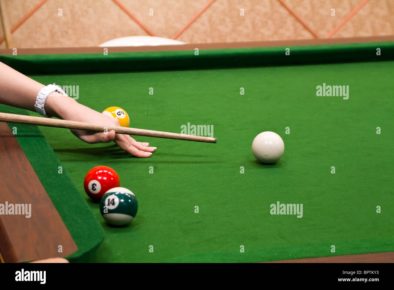 Woman's hand preparing to hit pool ball Stock Photo Alamy