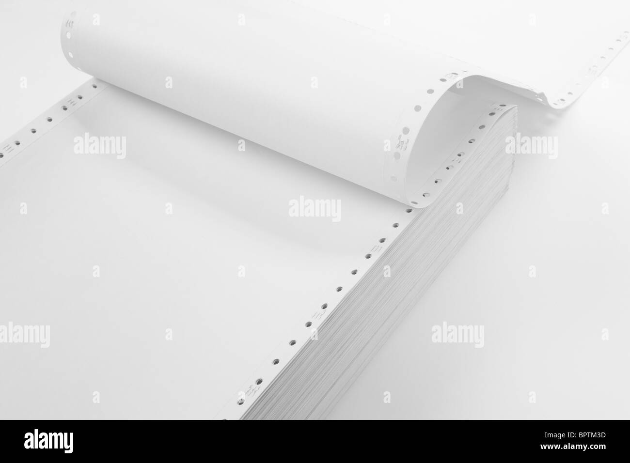Perforated Computer Paper for background Stock Photo - Alamy
