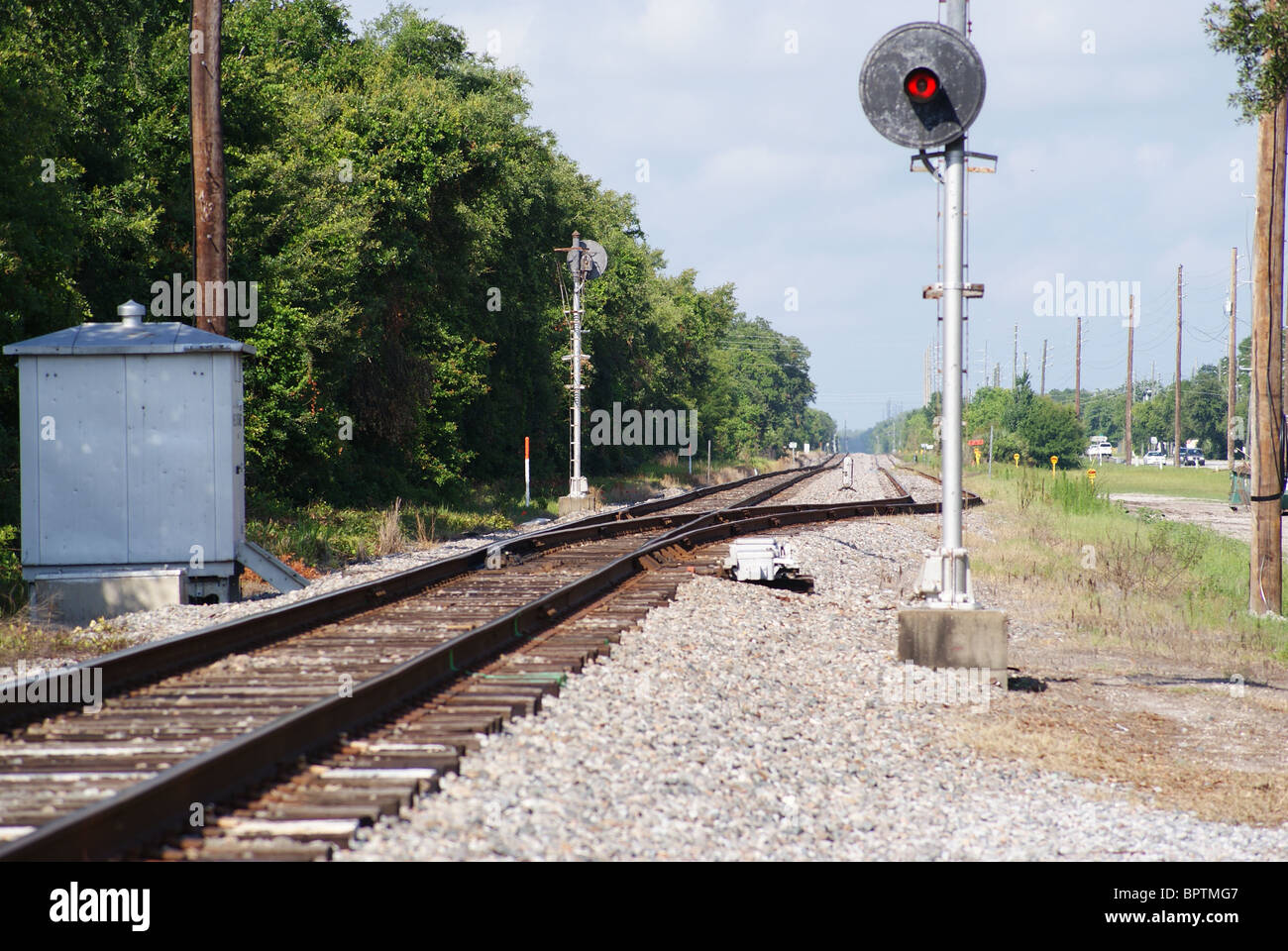 Railroad spur with control lighting and equipment shack Stock Photo Alamy