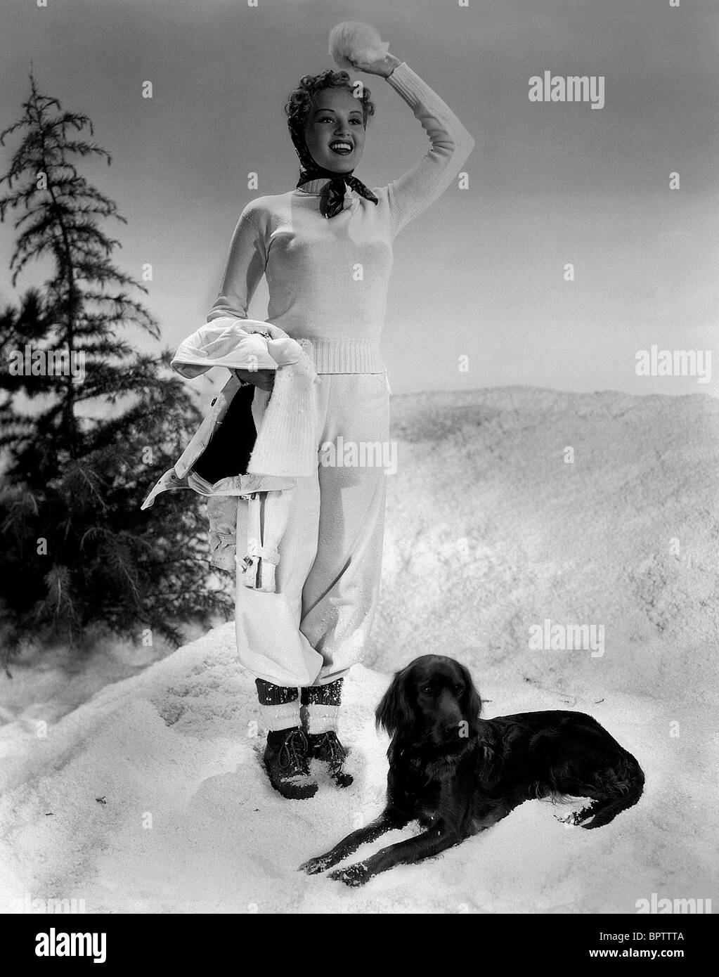 BETTY GRABLE & DOG ACTRESS (1946) Stock Photo