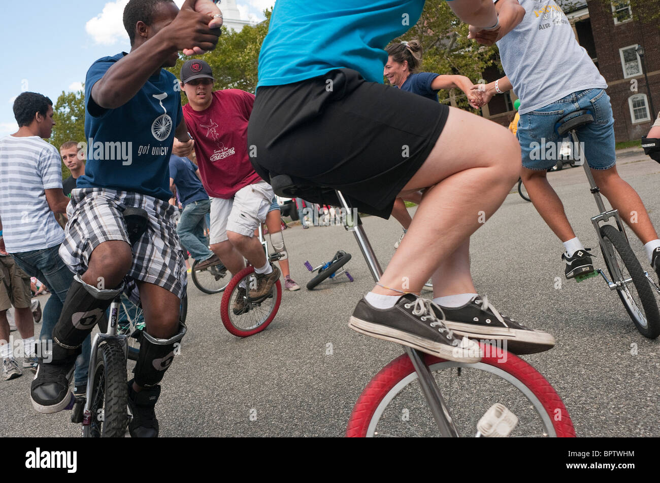 Unicyclists ride in a circle during the New York City Unicycle Festival